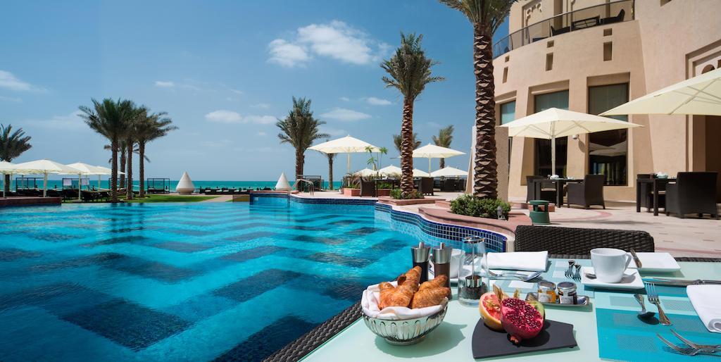 Bahi Ajman Palace Hotel Bagian luar foto The pool at the Ritz-Carlton, Ras Al Khaimah