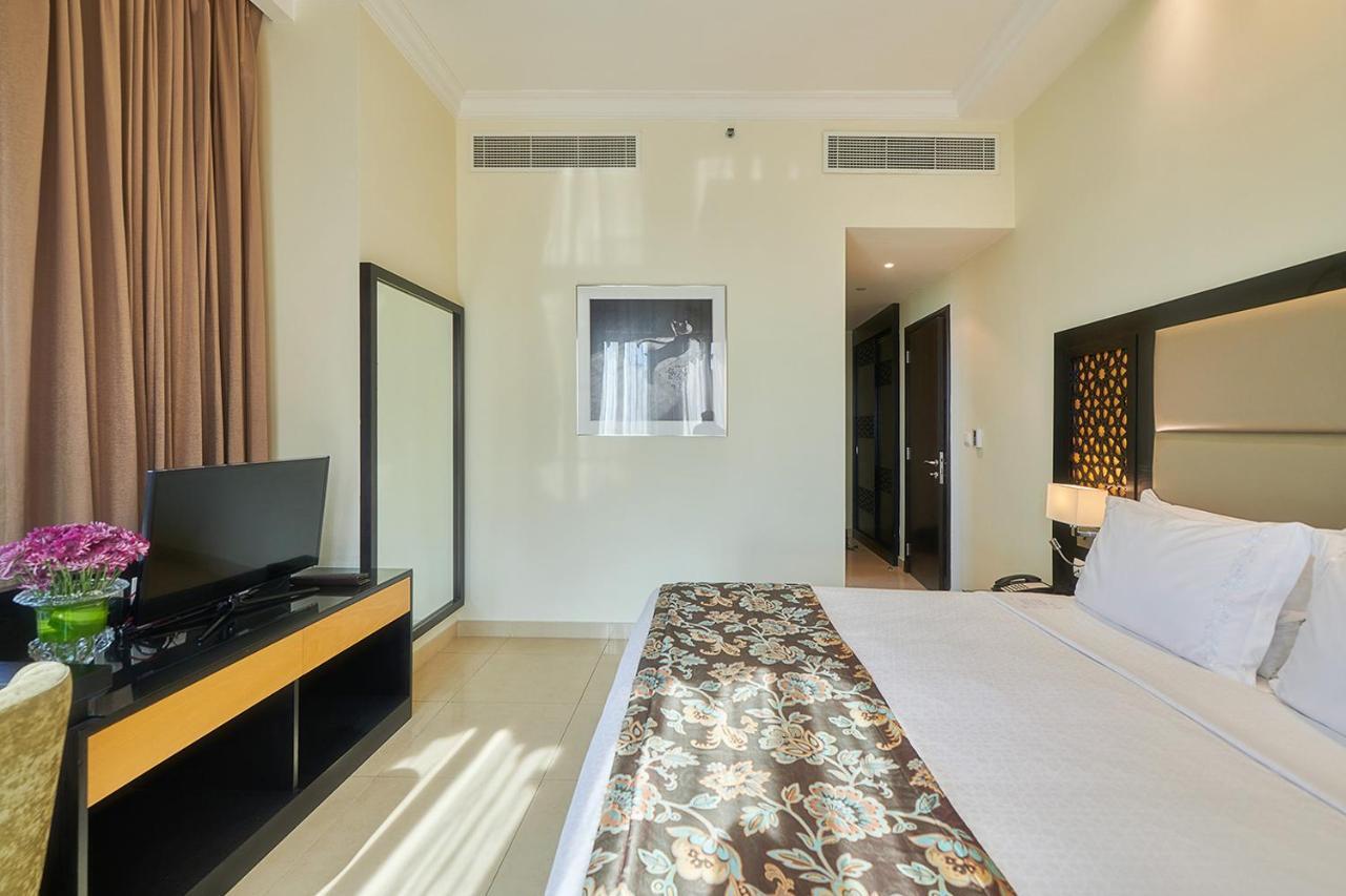 Bahi Ajman Palace Hotel Bagian luar foto Deluxe Room