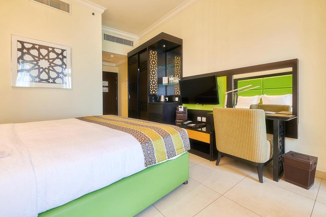 Bahi Ajman Palace Hotel Bagian luar foto Deluxe room