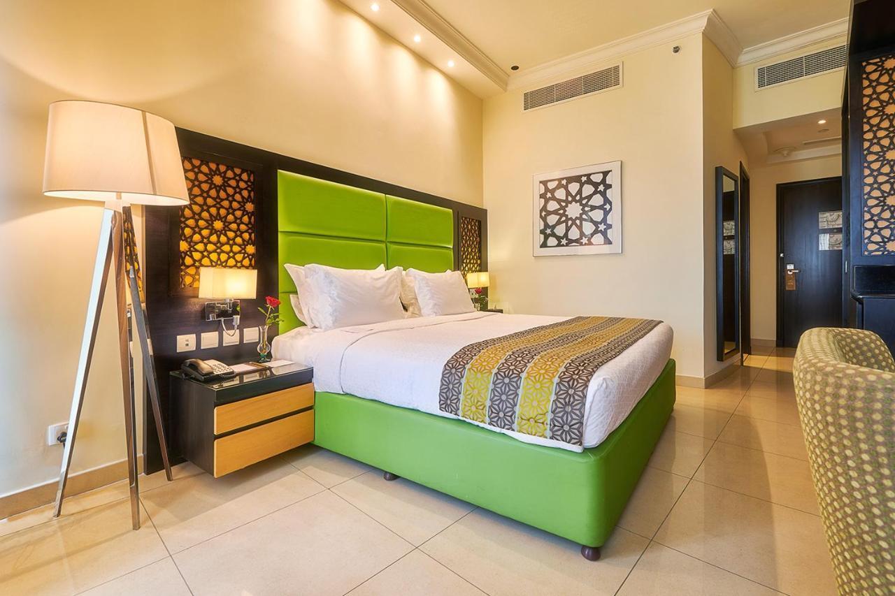Bahi Ajman Palace Hotel Bagian luar foto Deluxe Room